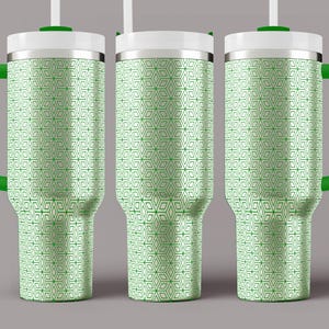 May include: Three stainless steel tumblers with green lids and handles. The tumblers have a white background with a green geometric pattern.