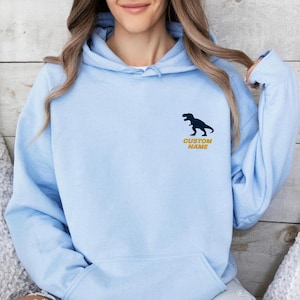 Custom Name Embroidered T-Rex Silhouette Hoodie And Sweatshirt, Personalized Dinosaur Sweater, Cozy Gift for Dino Lovers, Unique Apparel