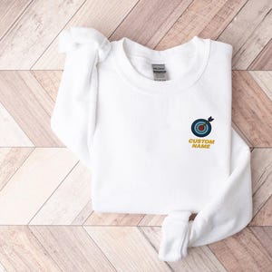 Custom Name Embroidered Bullseye Target Hoodie and Sweatshirt, Precision Gift for Him, Sharp Shooter Pullover, Archery-Inspired Apparel