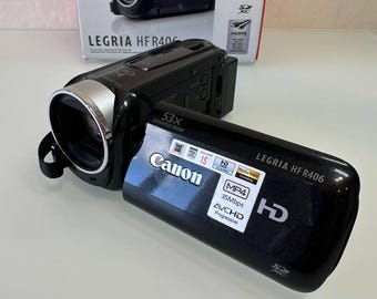Filmadora Canon Legria HF R406 Full HD com zoom de 32x, AVCHD e MP4. Testada e funcionando.