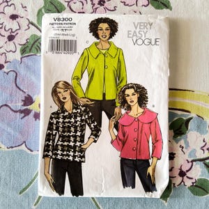 May include: A Very Easy Vogue pattern packet, V8300, featuring illustrations of three different jacket styles. The jackets are in lime green, black and white houndstooth, and pink. The packet includes sizes small to large.