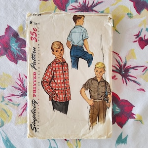May include: Vintage Simplicity sewing pattern for boys' shirts and pants. The pattern features illustrations of boys in various outfits, including a plaid shirt, striped shirt, and fishing attire. The pattern is size 4 and includes the price of 35 cents.