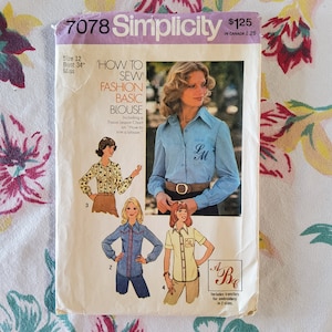 May include: Vintage Simplicity sewing pattern 7078 for a basic blouse. The pattern features illustrations of different blouse styles, including a long-sleeved blue shirt with embroidery. The pattern includes a tissue lesson chart and transfers for embroidery.