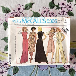 May include: A vintage McCall's sewing pattern, number 5366, featuring illustrations of dresses and jumpsuits. The pattern includes a bust size of 31 1/2 inches. The cover displays a variety of styles, with the text "Quick & Easy" and "Carefree Patterns".