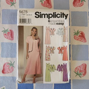 May include: A Simplicity sewing pattern envelope 5675 for size HH 6, 8, 10, 12. The front displays a photograph of a pink dress and jacket ensemble, along with illustrations of six variations of dresses and jackets in different colors and floral patterns.
