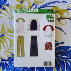 May include: A New Look 6404 sewing pattern envelope featuring illustrations of various loungewear garments including raglan sleeve tops, long pants, and shorts. The white envelope displays the text His & Hers Easy and includes a barcode at the bottom.