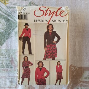 May include: A sewing pattern for a jacket and skirt. The pattern includes four different views of the garment. The pattern is for sizes 10, 12, and 14. The pattern is from Style Lifestyles.