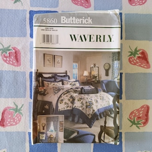 May include: A Butterick sewing pattern envelope, featuring a Waverly design. The image on the front shows a bedroom set with floral bedding, curtains, and a clock. The envelope is labeled "5860" and "ONE SIZE".