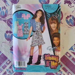 Simplicity 1895 Complete Uncut Factory Folds Sewing Pattern Disney Shake it Up Kids Sundress Bolero Puff Sleeve Jacket Size 7-16 Chest 26-34