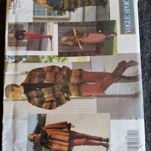 May include: A vintage Vogue Sport sewing pattern envelope featuring a striped sweater, a brown cape, and pants. The pattern number is 1213 and the size range is 6-8-10.