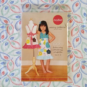Modkid Naomi Complete Uncut Factory Folds Independent Sewing Pattern Sundress and Top Braided Straps Ruffled Hem Size 2T-10