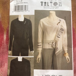 May include: A sewing pattern for a top with a draped neckline. The pattern is from Vogue Patterns and is designed by Marcy Tilton. The pattern number is V8559 and the size is X-Small to Medium.