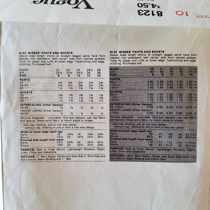 May include: A vintage sewing pattern for misses' pants and shorts, featuring measurements for waist, hip, and size. Includes fabric requirements and notions. The pattern is from the Vogue brand.