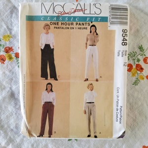 May include: McCall's Classic Fit One Hour Pants sewing pattern, size 12. The pattern includes instructions for making pants with a variety of styles, including wide-leg, straight-leg, and cropped.