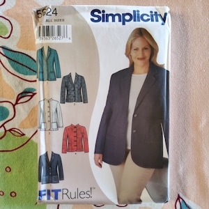 May include: Simplicity sewing pattern number 5624 for a blazer. The pattern includes instructions for four different styles of blazers, including a classic blazer, a mandarin collar blazer, and a blazer with a pocket detail. The pattern is for all sizes.