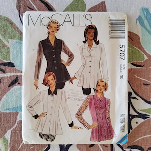 May include: A vintage McCall's sewing pattern featuring illustrations of women's jackets and tops. The pattern number is 5707, size 10. The cover includes the text "MOCALL'S" and "PATTERN/PATRON". The pattern is on a floral background.