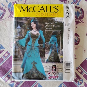 May include: A sewing pattern for a peacock costume. The pattern is for sizes 6-8-10-12-14. The pattern is from McCall's Costumes and is called Yaya Han's Original Peacock Costume.