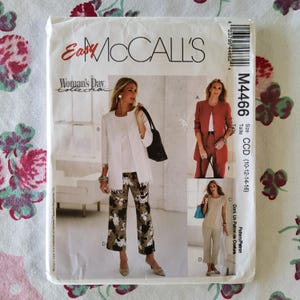 May include: A sewing pattern for a jacket and trousers. The pattern is for sizes 10-12-14-16. The pattern is called "Easy McCall's Woman's Day Collection" and the pattern number is M4466.