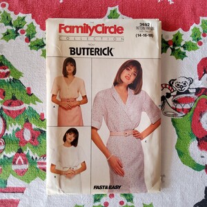 Puede incluir: Un patrón de costura vintage de la colección Family Circle de Butterick. El patrón es para un vestido con cuello y mangas cortas. El número del patrón es 3692 y la talla es 14-16-18.