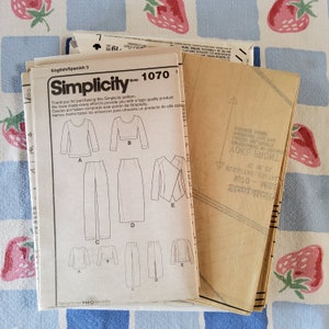 May include: Simplicity sewing pattern number 1070, with instructions in English and Spanish, for a women's top, trousers, skirt, and jacket. The pattern includes a variety of styles and sizes.