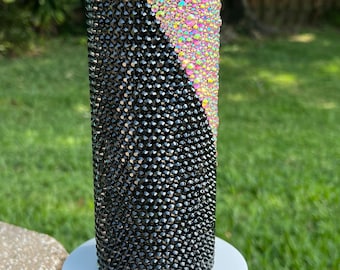 20oz stainless steel tumbler with black honeycomb and a pink scatter.