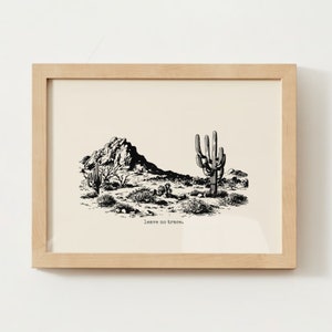 May include: Black and white illustration of a desert landscape with mountains, cacti, and the text "leave no trace."