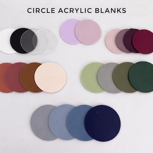 May include: A collection of circle acrylic blanks in various colors, including white, black, clear, pink, purple, red, brown, green, and blue. The text "CIRCLE ACRYLIC BLANKS" is at the top of the image.