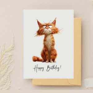 May include: A greeting card featuring a cartoon orange cat with a grumpy expression. The card has the text "Happy Birthday!" written in black cursive.