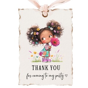 May include: A thank you tag with a cartoon illustration of a girl with brown hair and a pink flower. The text on the tag reads "Thank you for coming to my party".