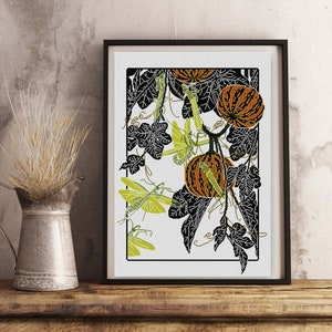 May include: A black and white illustration of a pumpkin vine with green praying mantises and orange pumpkins. The background is white.