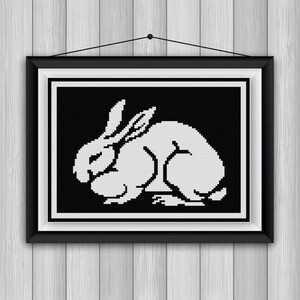 Simple Sitting Rabbit cross stitch pattern PDF black and white silhouette Julie De Graag