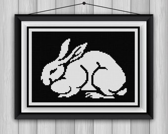 Simple Sitting Rabbit cross stitch pattern PDF black and white silhouette Julie De Graag