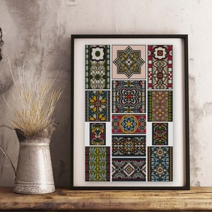 May include: A framed print with 16 colorful geometric patterns in a grid layout. The patterns are a mix of floral, geometric, and abstract designs. The frame is black and the print is on white paper.