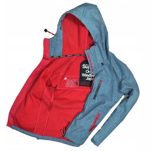 May include: A blue hooded jacket with a red interior. The jacket has a zipper closure, red accents, and the text "Superdry" on the inside. The jacket is a size small.
