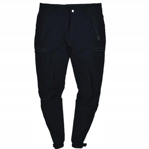 May include: Black outdoor pants with multiple zippered pockets and a button closure. The pants have a tailored fit and are designed for outdoor activities. The pants have a drawstring at the ankles.