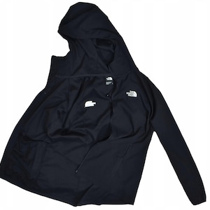 May include: Black hooded jacket with a zipper closure and two front pockets. The North Face logo is visible on the chest and inside the jacket. The jacket has a hood and long sleeves.