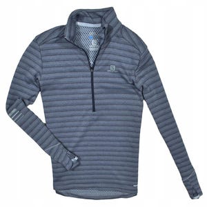 May include: Gray long-sleeve athletic shirt with a half-zip closure and a striped pattern. The shirt features the Salomon logo on the chest and thumb holes at the cuffs. The shirt is designed for running and other outdoor activities.