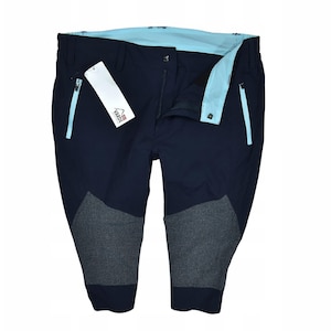 May include: Navy blue outdoor trousers with light blue detailing and grey knee patches. The trousers feature a zip fly and two side pockets with light blue zips. A white tag with the brand name "VARDE" is attached.