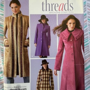 May include: Simplicity pattern 4033 for a coat, featuring three variations: a tan coat with decorative trim, a solid purple coat with a high collar, and a plaid coat with a dark collar. The package includes text: Step by step to sewing success!