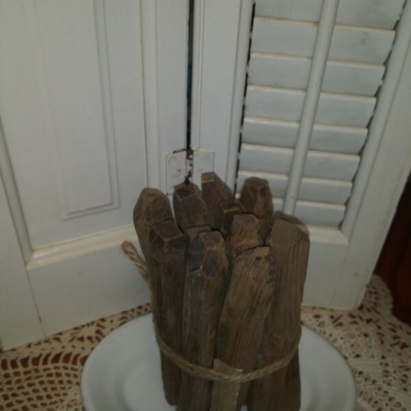 Primitive 12 Hand carved Pegs with Provenance