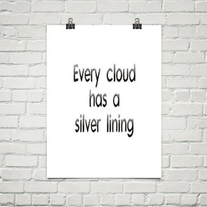 May include: White poster with black text that reads "Every cloud has a silver lining".