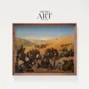 Puede incluir: Una pintura al óleo enmarcada que representa una caravana de camellos y personas en un paisaje desértico. La pintura está situada sobre un fondo de cielo azul con nubes blancas. Los camellos son marrones y las personas visten ropa colorida. La pintura está enmarcada en un marco de madera oscura.