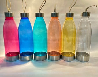 May include: Six reusable water bottles with different colored lids and bodies. The bottles are clear, pink, blue, teal, peach, and yellow.