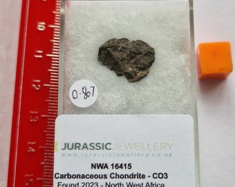 Carbonaceous Chondrite  Meteorite -ULTRA RARE Meteorite Type - NWA 16415 -  - Boxed and Certificated  -  0.807 Grams