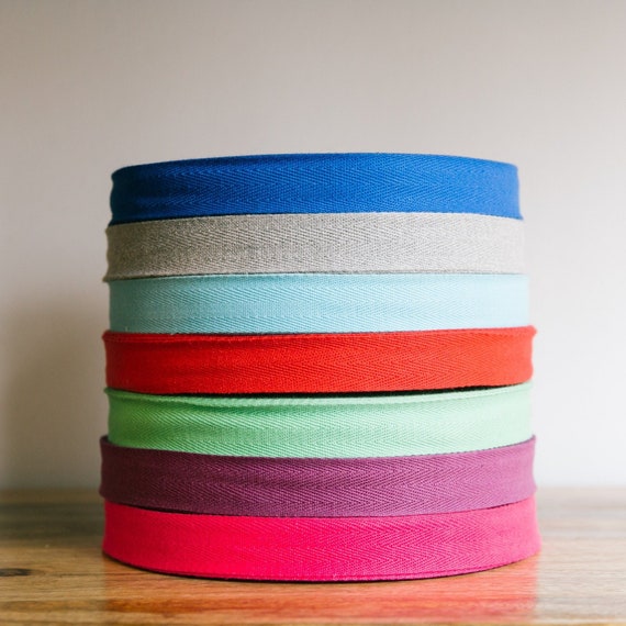 25mm CHOICE OF COLOURS 1 INCH COTTON BIAS BINDING TAPE 50 METRE ROLL 25mm CHOICE OF COLOURS 1 INCH COTTON BIAS BINDING TAPE 50 METRE ROLL