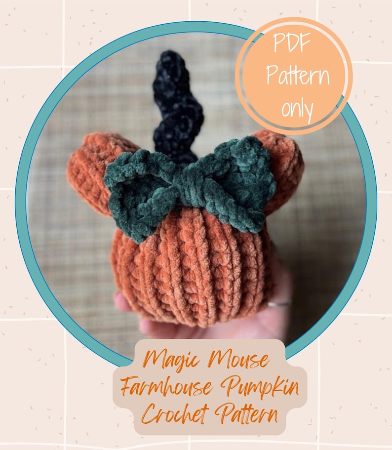 May include: A crochet pattern for a magic mouse farmhouse pumpkin. The pumpkin is orange with a green bow and a black stem. The pattern is available as a PDF download only.
