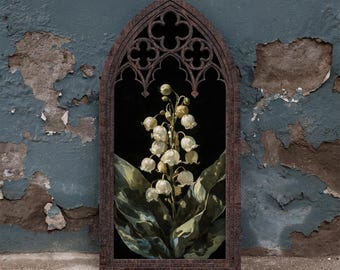 May include: A dark brown wooden wall hanging featuring a pointed gothic arch frame with intricate quatrefoil cutouts at the top. The center displays a detailed illustration of white lily of the valley flowers with green leaves on a black background.