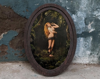 May include: An oval-shaped wooden frame containing a painting of a person with long red hair standing in a dark forest. The person is partially wrapped in a dark snake, with the serpent coiled around their legs and resting near their shoulder.