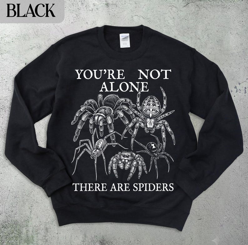 Black sweatshirt with spiders and "You're not alone, there are spiders" text.