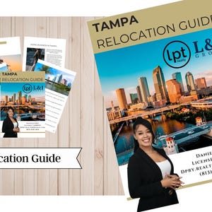 May include: A collection of printed guides and brochures on a light wood surface. The main guide is titled "TAMPA RELOCATION GUIDE" with a skyline image and a woman in a blazer. Additional brochures include "GULF COAST" and "DOING BUSINESS IN TAMPA".